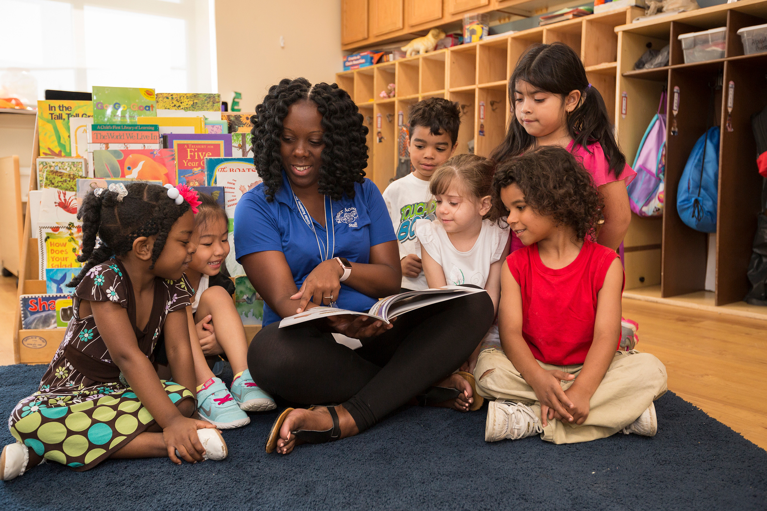 Students at Kinder Academy work on literacy skill development