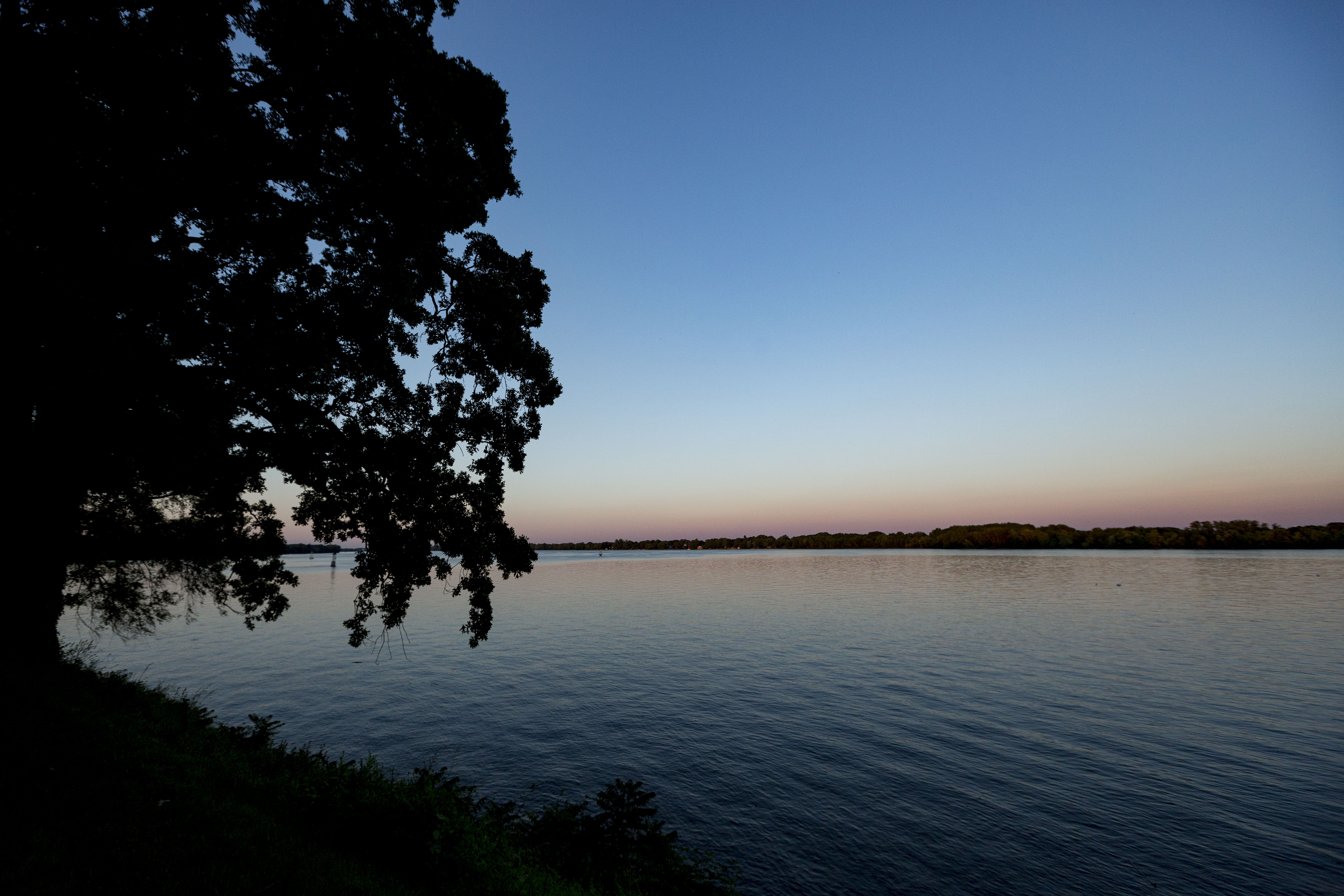 A view over the Delaware River at dusk.
